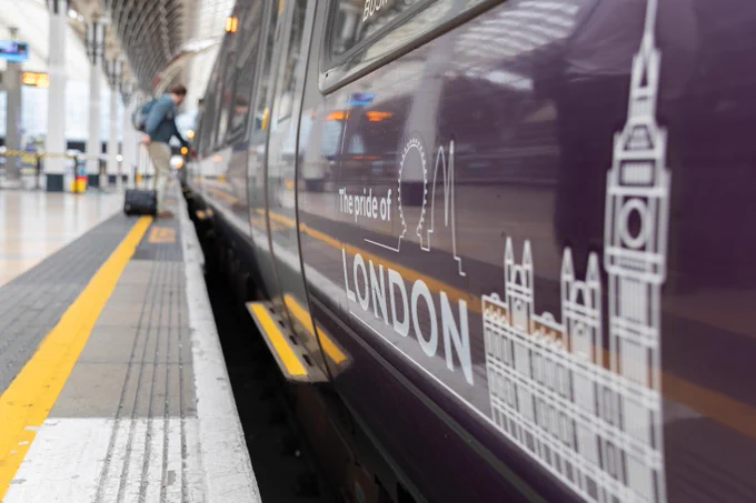 A low image of the Heathrow Express train showing the carriage name 'London'.
