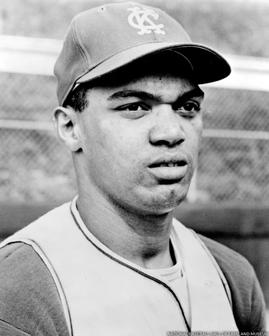 Black and white head and shoulders portrait of Reggie Jackson in a Kansas City Athletics cap. (National Baseball Hall of Fame and Museum)