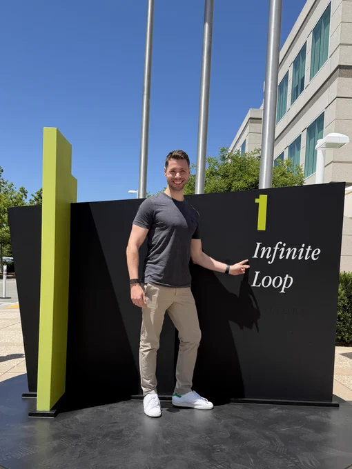 Photo of Aled in front of the 1 Infinite Loop sign.