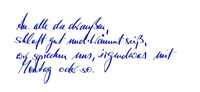 Handgeschriebener Abendgruß: an alle da draußen, schlaft gut und träumt süß, wir sprechen uns, irgendwas mit Montag oder so. In blauer Schrift.