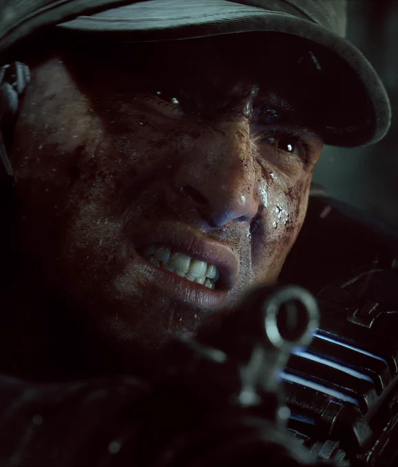 Portrait of Lucas Reyes looking aggressive, face sprayed with blood and off to the right side.