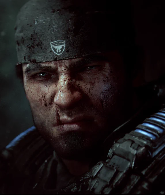 Portrait of Marcus Fenix looking fiercely into the camera, blood-splattered.