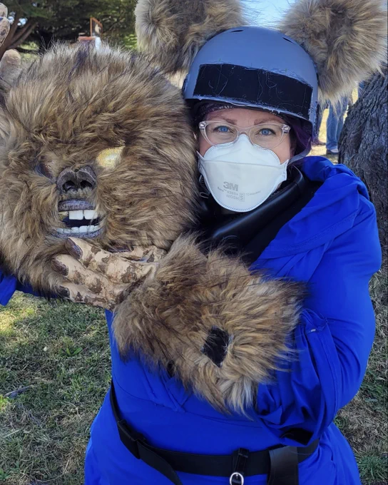 At the Forest Moon Festival in Humboldt, CA, Ruth (@r2inatutu) dressed up as Ewok Jedi, wore a 3M N95 under the cosplay. She took off the Jedi’s head for a selfie.