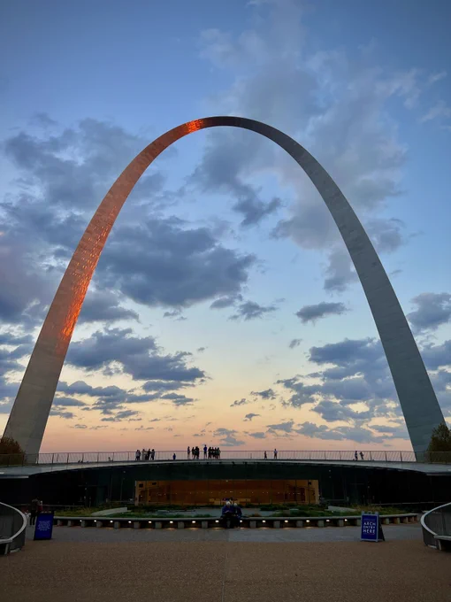 View of the the sunset reflecting off the Gateway Arch.  