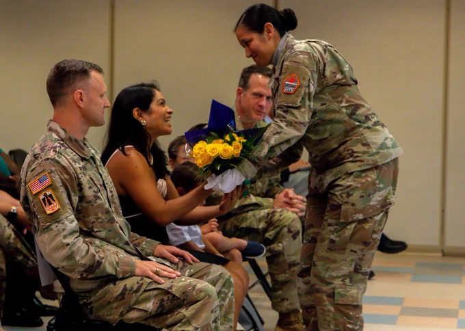 The official welcome to Maj. Kevin F. Plude's family into the CCoE HHD Command Team at the CoC ceremony on 4 June 2026. Photo by Staff Sgt. Xavier Legarreta, CCoE Public Affairs