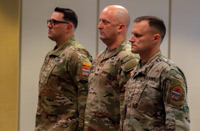 15th Signal Brigade Commander, Col. William Chercauskus, Maj. Todd Donaldson, and Maj. Kevin F. Plude, at the Headquarters and Headquarters Detachment (HHD), U.S. Army Cyber Center of Excellence,  Change of Command ceremony, 4 June 2026.Photo by Staff Sgt. Xavier Legarreta, CCoE Public Affairs