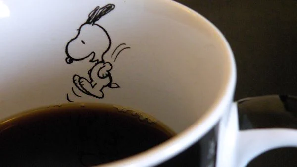 Illustration of a dog that you know, that is jumping into my mug of cola, that is also a writer( the dog, not the cola =)) ), who types on top of a dog house. =) And sends letters to his editor. =) Best writing mug ever! Write well! - Wrtr