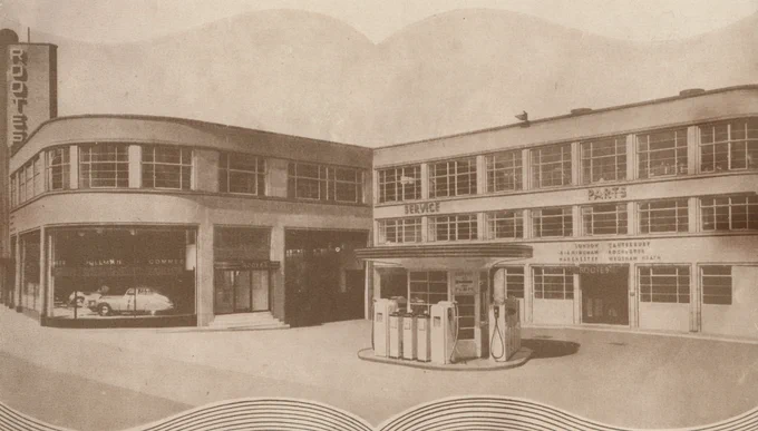 external photo of the Rootes Showroom in Maidstone with classic cars exhibited in the window