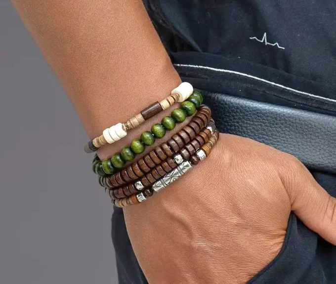 The cover photo features Florentina Jewellery's whole range made mostly from semi precious stone in a rainbow of colours, combined with silver highlights, wooden bead or lava stone.