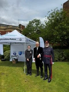 Professor Simon Gregory MBE DL (far right) pictured with the High Sheriff of Northamptonshire, Roger Butler and High Sheriff Cadet, Brooke.