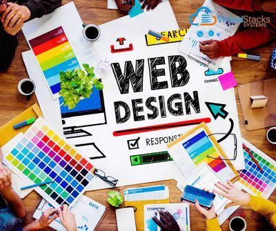 Illustration of color charts and web design plan on a wood work table; Virtual Stacks Systems logo.