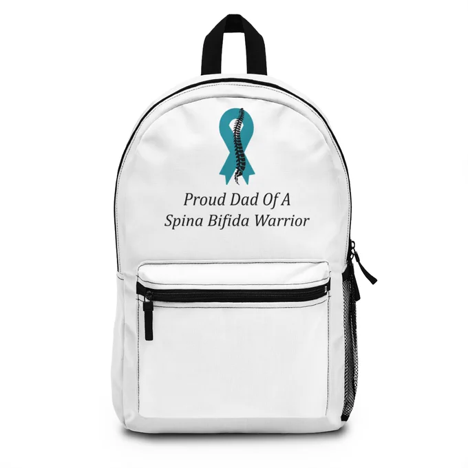 Proud Dad Of A Spina Bifida Warrior Backpack with Adjustable Straps. The backpack is white with adjustable straps. There is a teal ribbon with a black spine running down the middle of the ribbon in the front top section of the backpack. There is text underneath the ribbon that says Proud Dad Of A Spina Bifida Warrior.