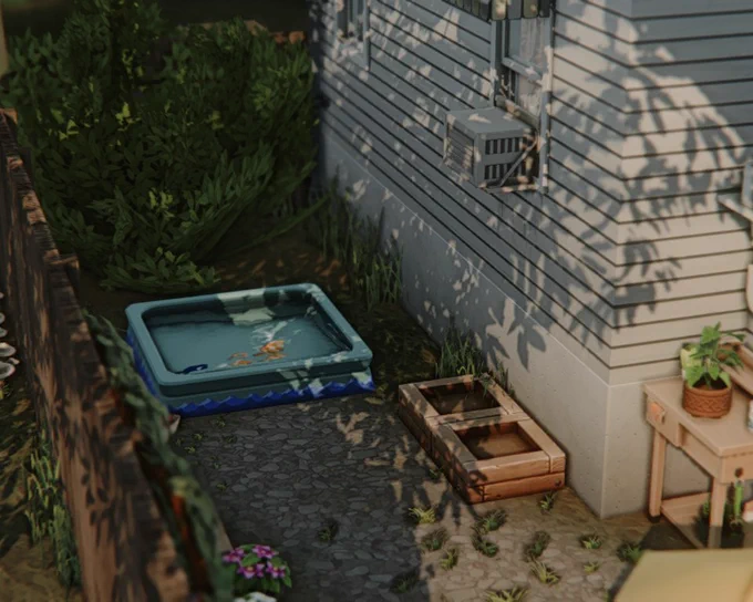 Small backyard with few planter boxes and kiddie pool!