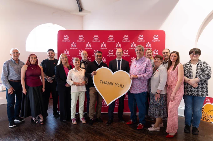 A group photo with Minister Lyons and King's Trust volunteers at the 50th Anniversary celebrations.
