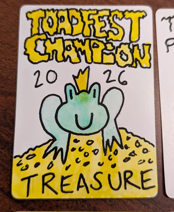 ToadFest champion token featuring a Toad atop a pile of treasure.
