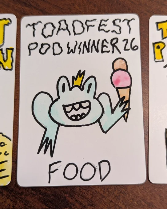 A food token with a toad holding ice cream