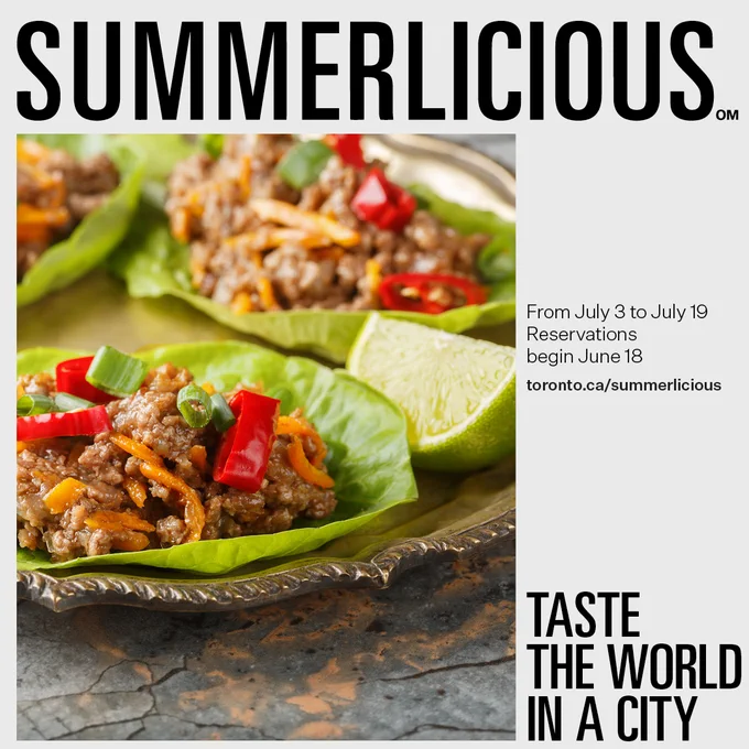 Close-up of lettuce wraps filled with seasoned ground meat, shredded cheese, sliced red chili, and green onions, served with lime wedges on a rustic plate.