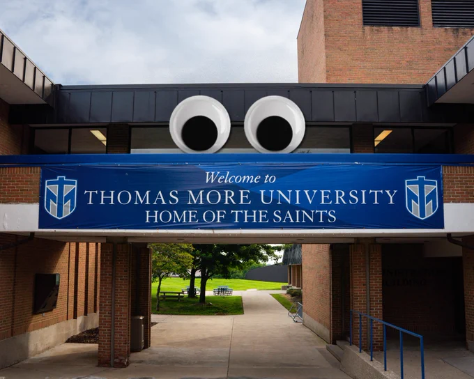 The front of campus with googly eyes on the pedway.