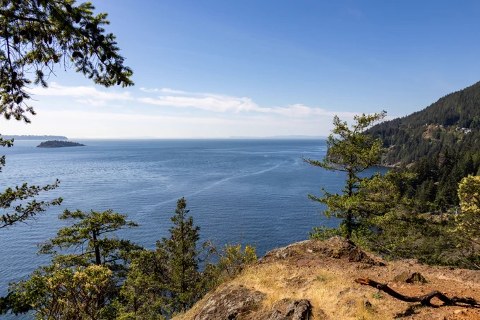 View of the Pacific Ocean and nearby islands from a cliff on Bowen Island, British Columbia.