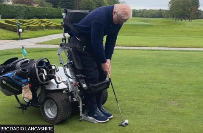 Alistair Bonham using a PowerGolfer to hit a ball on a golf course