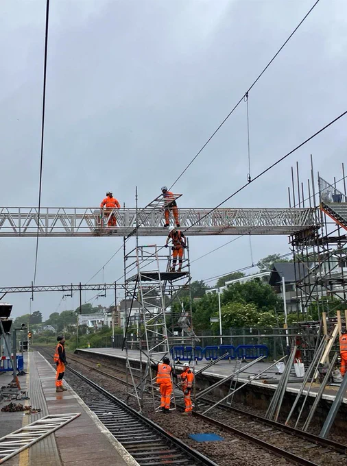 Behind the scenes image of our contractors building the foundations of the temporary footbridge
