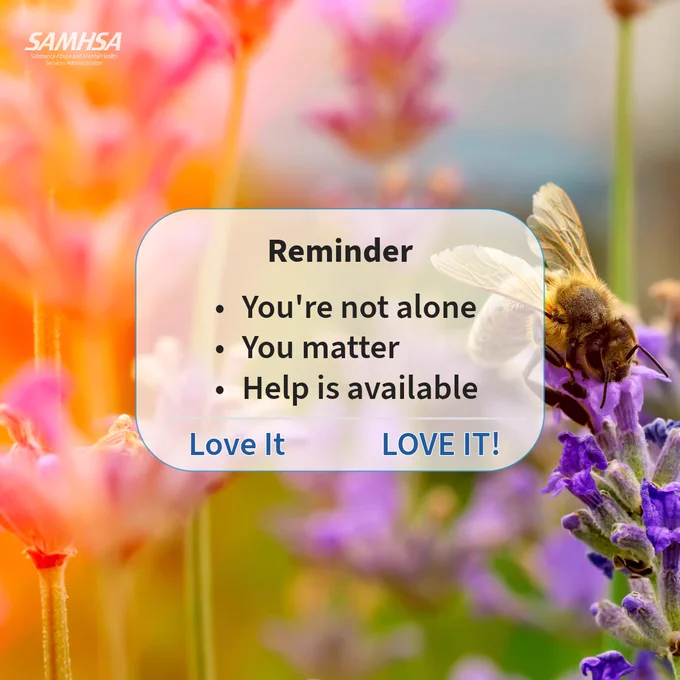 A bee on lavender with text overlay. The text reads: "Reminder: You're not alone, You matter, Help is available." The SAMHSA logo is in the top left corner. The background is a colorful, blurred garden.