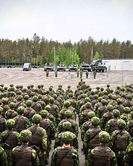 Soldiers stand in formation during the ceremony marking the establishment of NATO’s Forward Land Forces Finland. Photo by Swedish Army/Mats Carlsson