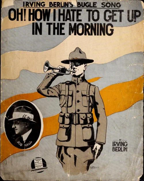 Vintage sheet music cover for Irving Berlin's 'Bugle Song' showing a soldier in uniform playing a bugle against a striped background.