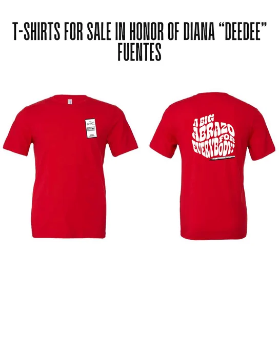 Red T-shirts with the text "A Big Abrazo for Everybody" on the back. The shirts are displayed with one front view and one back view, and are being sold in honor of Diana "Deedee" Fuentes.