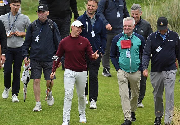 Rory McIlroy walks with members of the golf media during a practice round, ahead of the 2023 Open Championship at Royal Liverpool. (Getty Images)