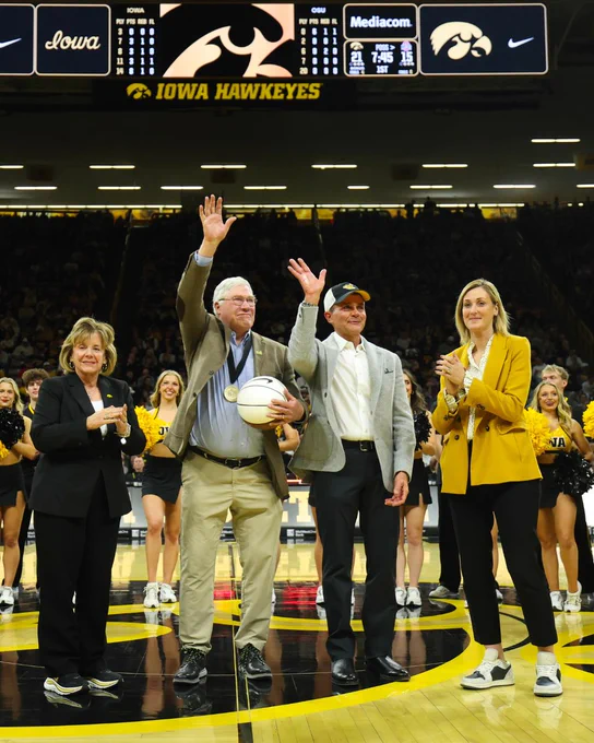 University of Iowa President Barbara Wilson, former Iowa Head Athletic Trainer Edward Crowley, Mark Kaufman, Founder and Executive Chairman of Athletico Physical Therapy, and Henry B. and Patricia B. Tippie Director of Athletics Chair Beth Goetz during the first half of the game at Carver-Hawkeye Arena in Iowa City, Iowa on Wednesday, February 25, 2026. Mark and Mary Ann Kaufman endowed the Director of Athletic Training Services position at Iowa. The position will be named in honor of Mark Kaufman’s mentor, Edward Crowley. 