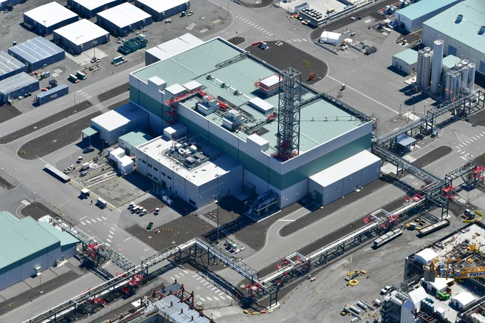Crews at the Hanford Waste Treatment Plant have immobilized 100,000 gallons of tank waste at the Low-Activity Waste Facility, pictured, since beginning hot commissioning in October 2025. Photo shows aerial view of plant.