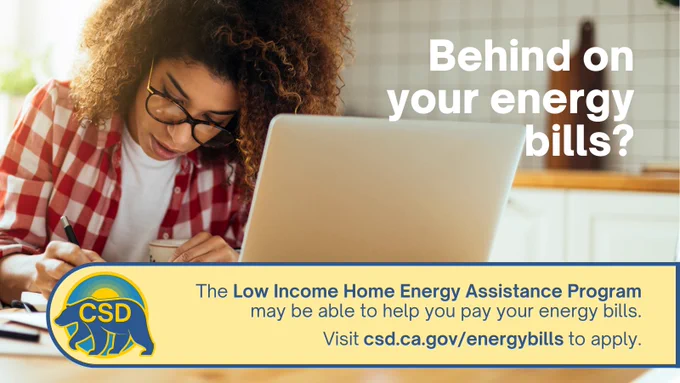 Person at their laptop, writing into a notebook. Overlaid messaging alongside logo for the Department of Community Services and Development: "Behind on your energy bills? The Low Income Home Energy Assistance Program may be able to help you pay your energy bills. Visit csd.ca.gov/EnergyBills to apply."