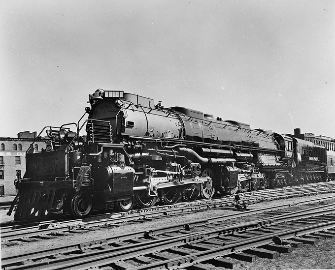 Big Boy is posed for a promotional photo in a railyard. The locomotives number boards above the front have not been placed.