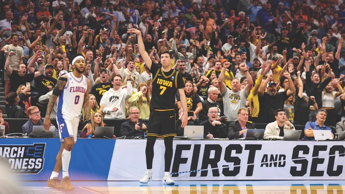 In the Sweet Sixteen, Iowa forward Alvaro Folgueiras makes a game-winning 3-pointer to upset the tournament’s returning national champions, the Florida Gators. The 73-72 victory took the Hawkeye men to the Elite Eight for the first time since 1987.