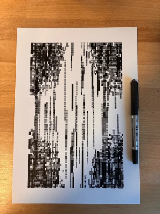 Abstract artwork with black geometric patterns forming vertical columns on white paper, pen lies beside on wooden surface