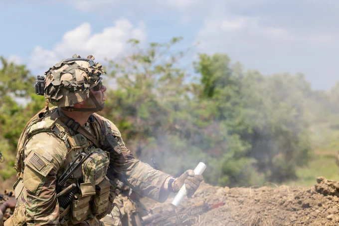 A U.S. Soldier assigned to 3rd Mobile Brigade, 25th Infantry Division, launches a signal flare during platoon live fire training as part of Salaknib 2026 at Fort Magsaysay, Nueva Ecija, Philippines, May 26, 2026.
