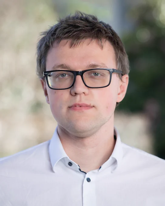 Headshot photo of Cyprian Lewandowski.