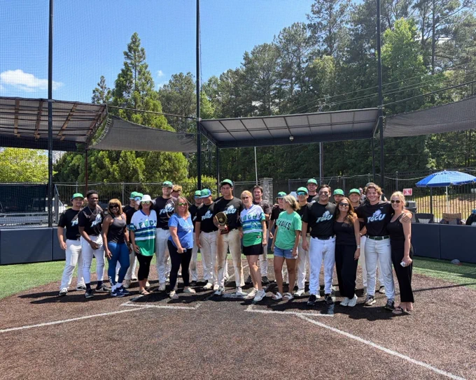 a group photo of the FGCU club baseball team and friends