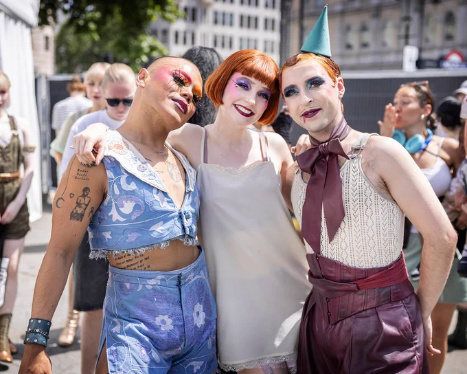The cast of Cabaret hugging and smiling backstage at West End LIVE.