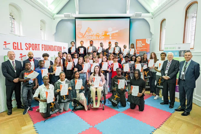Around 50 local sports stars with their certificates in Ashdown Hall.