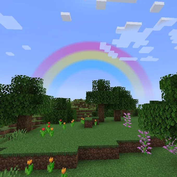 A Minecraft landscape shortly after rain has ended. There is a rainbow in the colors of the Pansexual pride flag in the background.