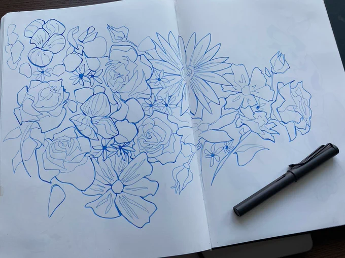 A sketchbook page of a random floral arrangement. The drawing is in blue ink and leans towards being somewhat abstract. 