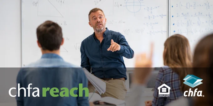 An instructor sitting on a desk, speaking to a room full of students with one of their hands raised and the chfareach, equal housing opportunity, and CHFA logos laid over the lower third of the photo.