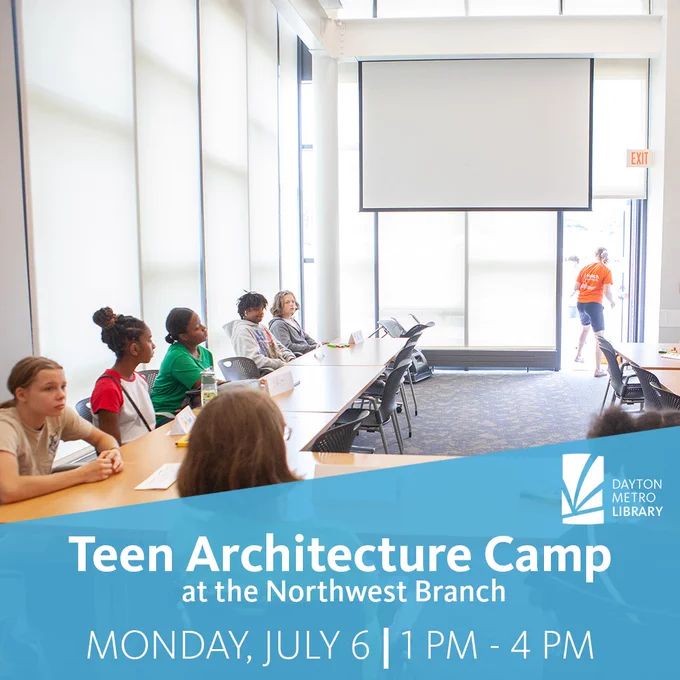 Teens sit around tables in a library meeting room, facing the front where a projection screen hangs. Large windows let in natural light, and one person stands near the doorway.