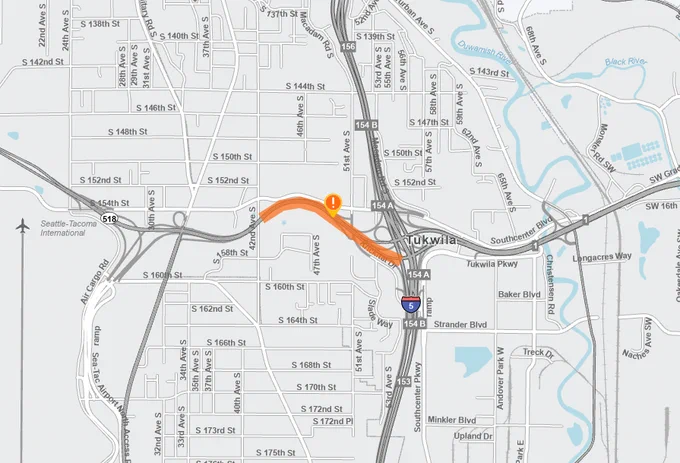 An orange line on eastbound SR 518 indicating where the ramp to northbound I-5 will close. 