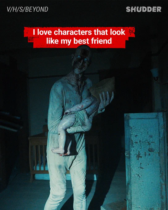 A haunting image featuring a sinister character holding a doll, with a humorous text overlay. The scene is dark and eerie, creating a chilling atmosphere.