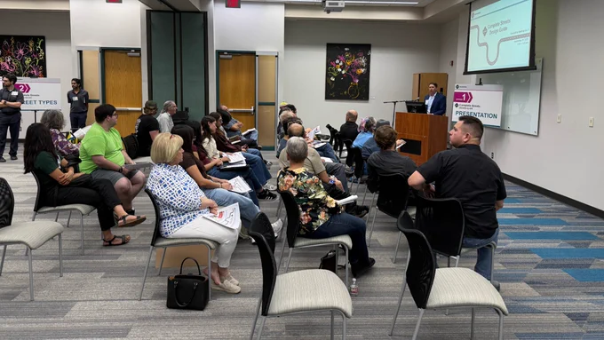 residents and business developers meet with city project team in a public meeting regarding complete streets designs and implementation.
