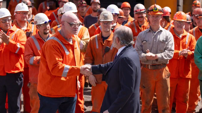 U. S. Steel President & CEO Dave Burritt shaking Commerce Secretary Howard Lutnick's hand.