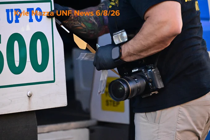 An NYPD officer carries evidence bags after collecting evidence including a shell casing at the scene where a 41-year-old man was fatally shot aboard an MTA Bx36 bus in the area of White Plains Road and East Tremont Avenue, Bronx, New York, USA, June 8, 2026. Monday afternoon at approximately 2:33 PM the fatal shooting transpired aboard the MTA bus. There are no arrests and the investigation is ongoing. The identity of the deceased is being withheld pending proper family notification.